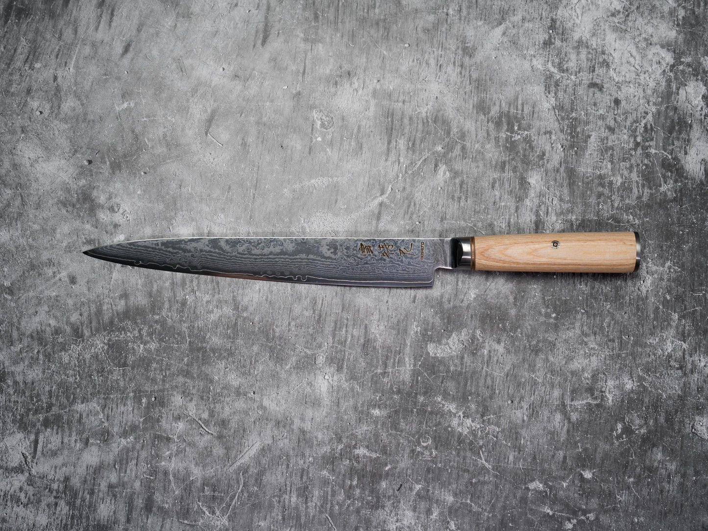 Mitre pleine soie Noseto Sujihiki 240 mm avec manche en bois de pakka