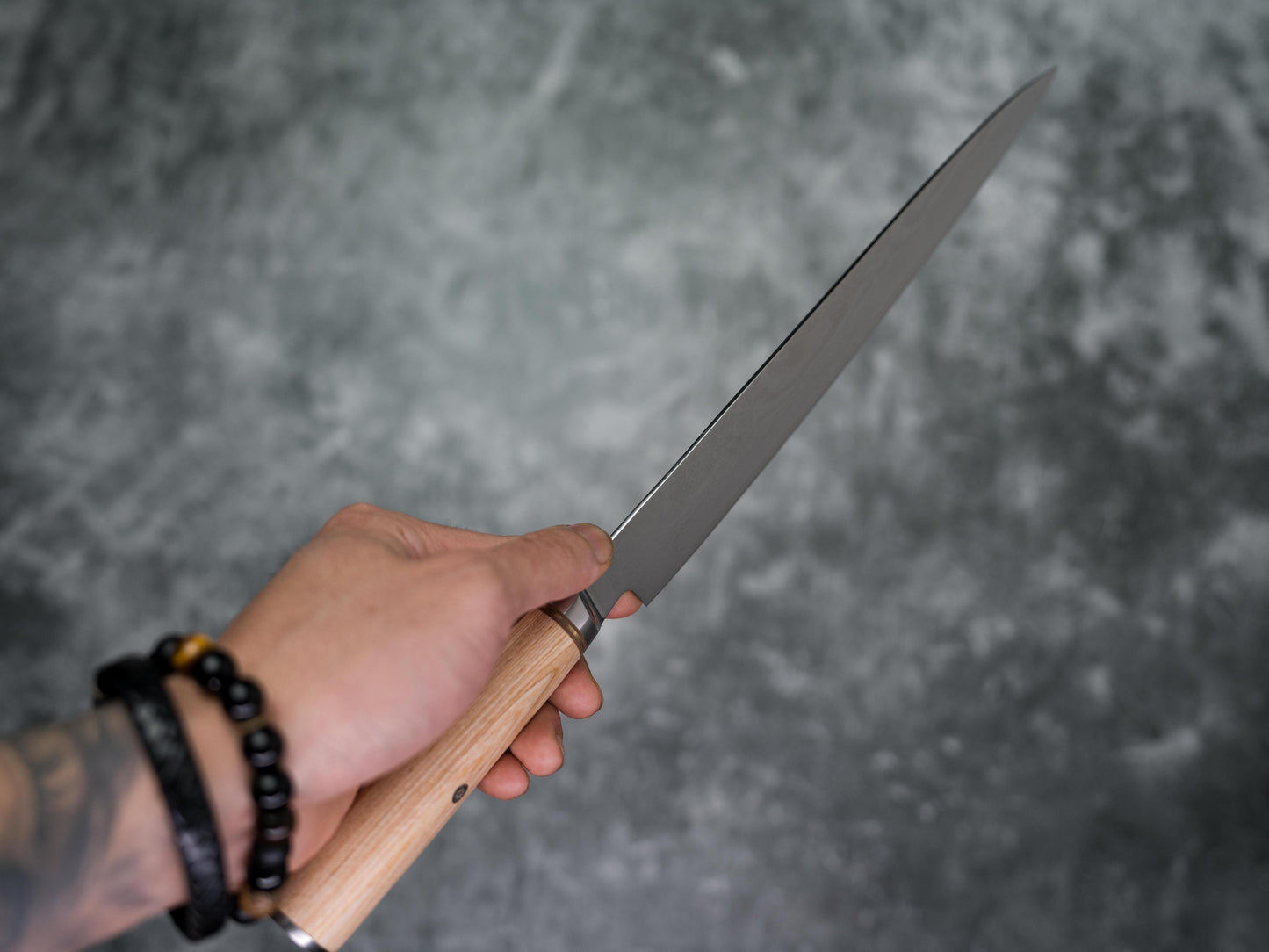 Mitre pleine soie Noseto Sujihiki 240 mm avec manche en bois de pakka