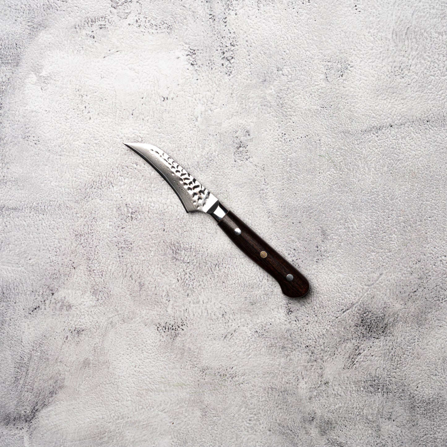Couteau à découper/parer Noseto Yohan en damas martelé 90 mm, manche occidental en palissandre