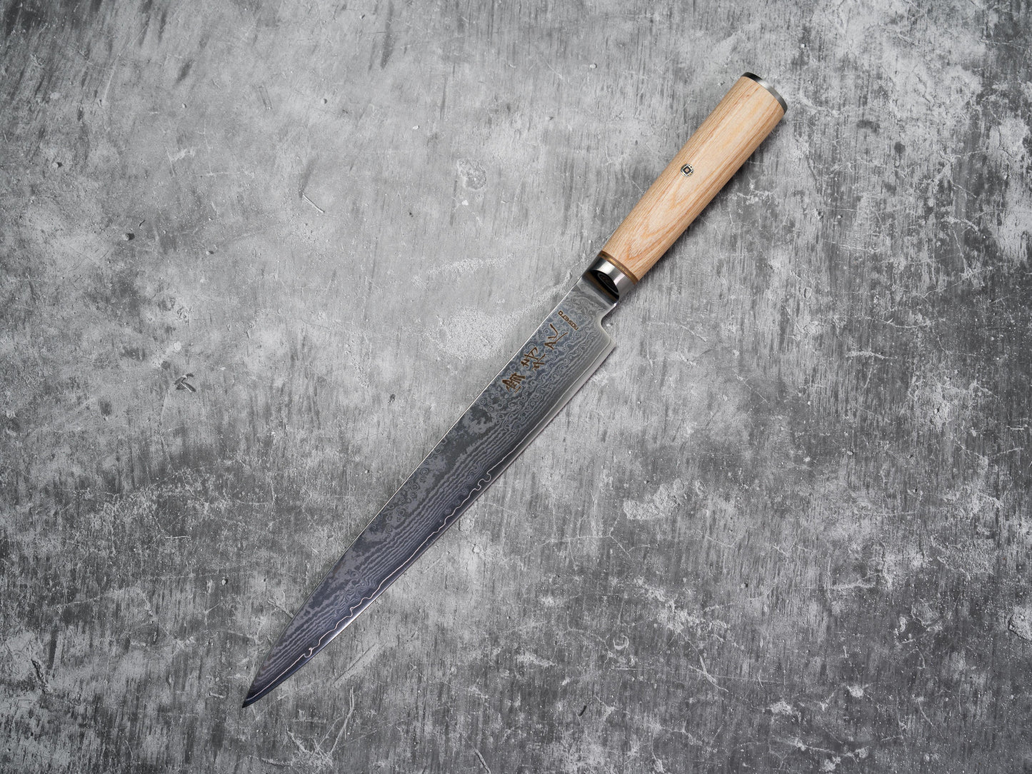 Mitre pleine soie Noseto Sujihiki 240 mm avec manche en bois de pakka