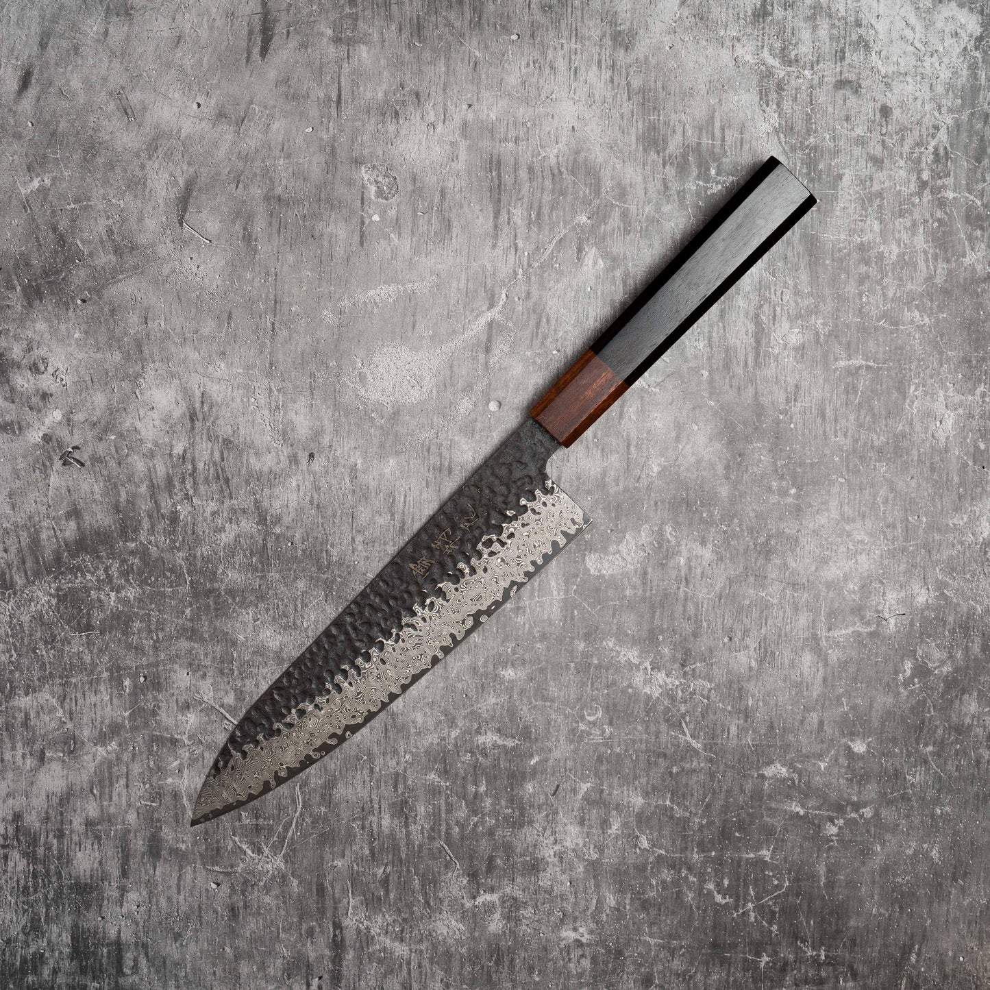 Noseto Kuki Gyuto 210mm 67 layers Damascus Tsuchime Finish Black Pakka Wood