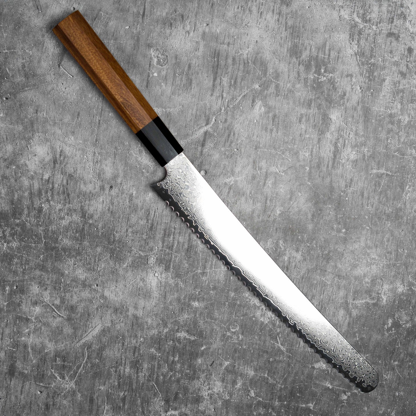 Couteau à pain Noseto 240 mm en acier Damas 67 couches avec manche en bois rouge et ébène