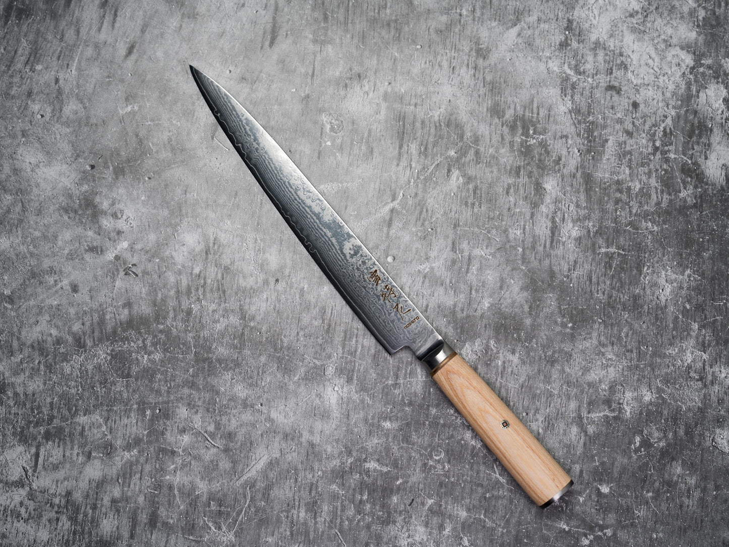 Mitre pleine soie Noseto Sujihiki 240 mm avec manche en bois de pakka