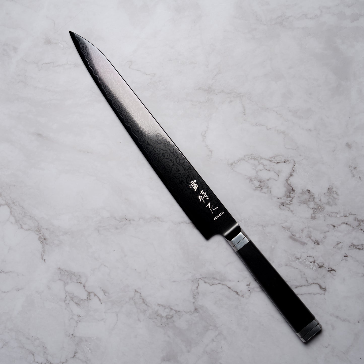 Noseto Buto Sujihiki 240mm Aus-8 Black Titanium Damascus Ebony Handle