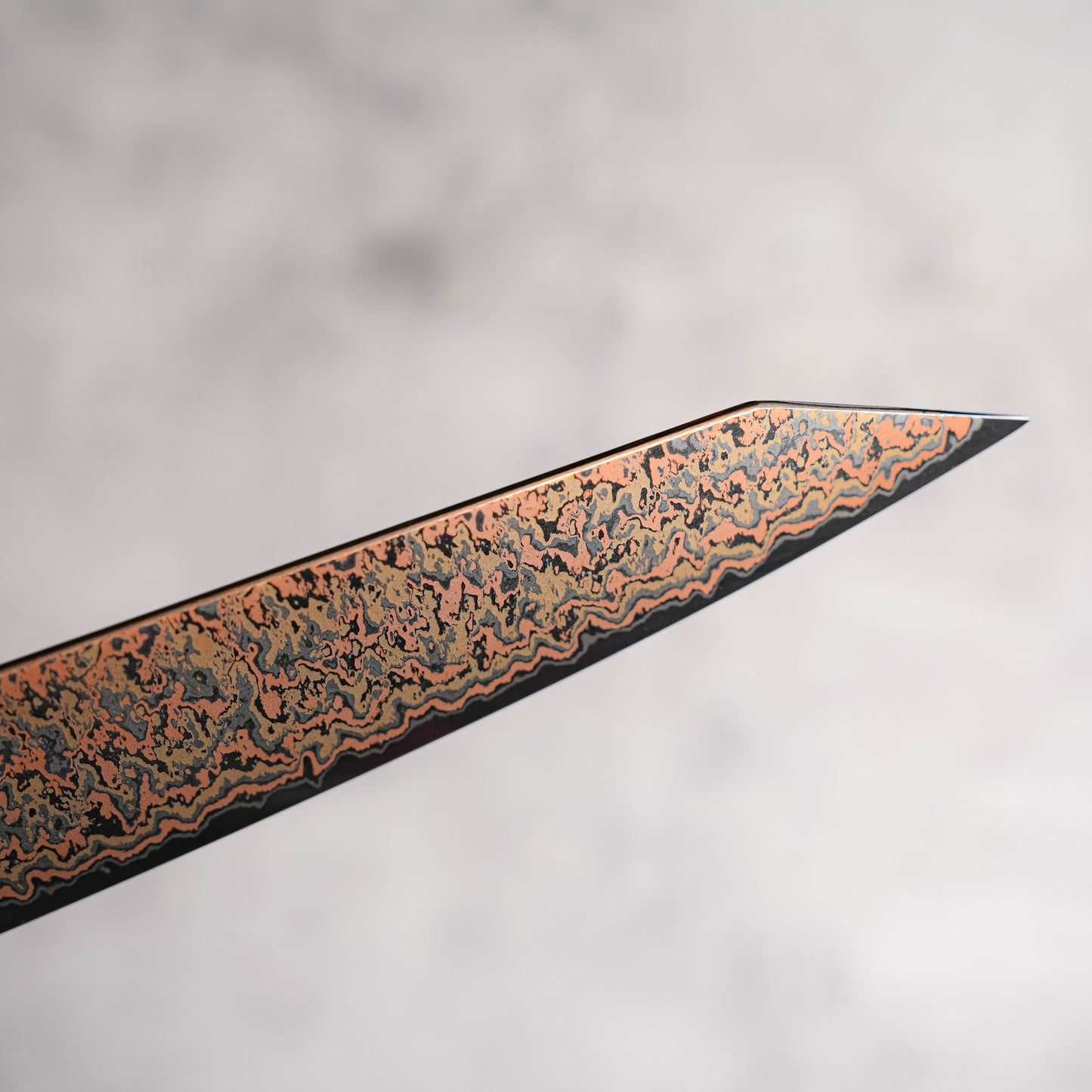Noseto Tricolour Copper Damascus Gyuto 210mm 53 Layer Damascus with Padauk Burl, Cupronickel & Black G10 Handle