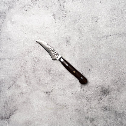 Couteau à découper/parer Noseto Yohan en damas martelé 90 mm, manche occidental en palissandre