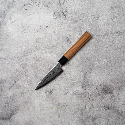 Couteau à éplucher Noseto Nato 105 mm 67 couches Damas avec bois d'olivier et corne de buffle