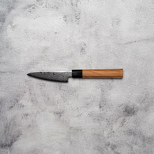 Couteau à éplucher Noseto Nato 105 mm 67 couches Damas avec bois d'olivier et corne de buffle